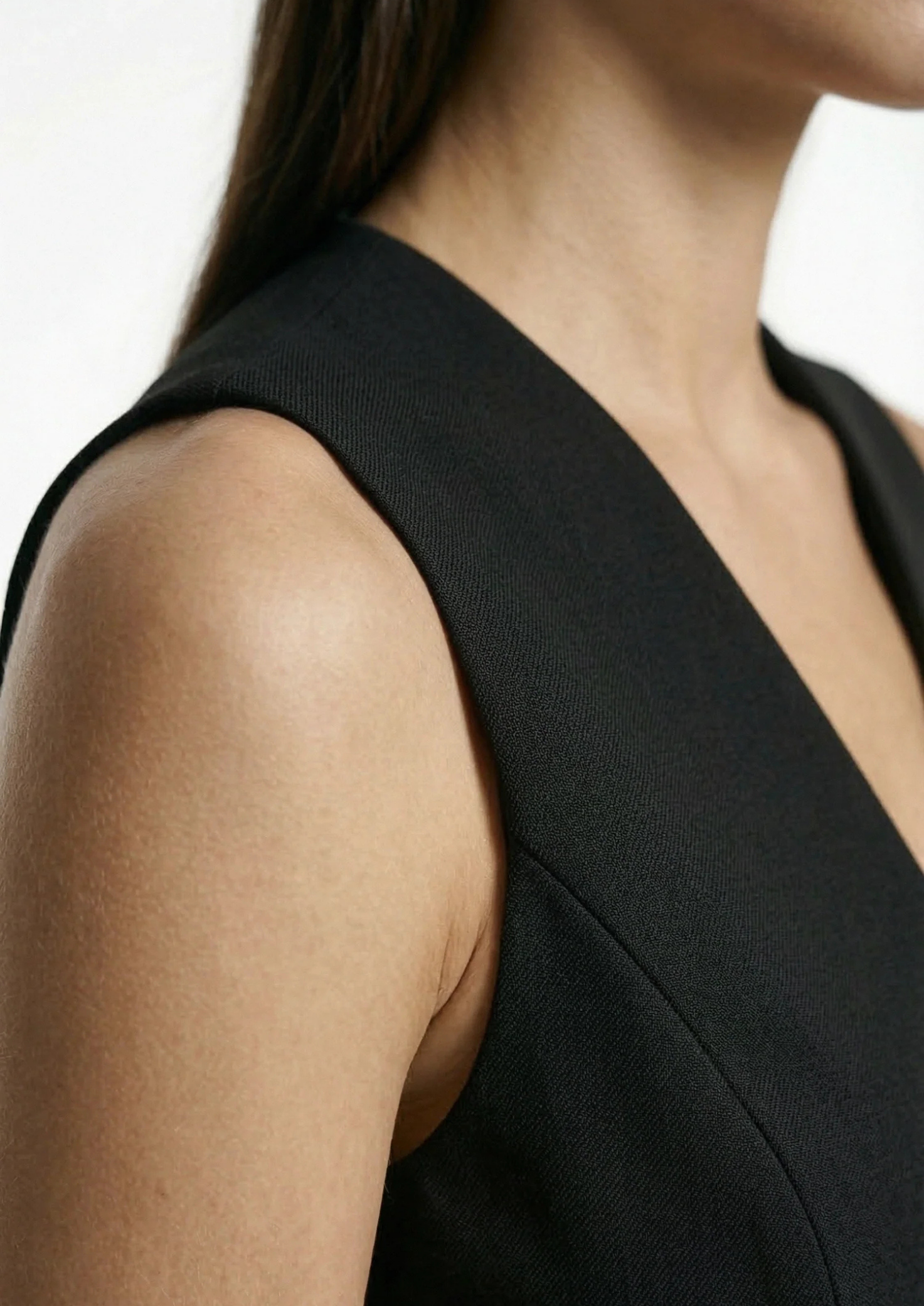 Women’s Sleeveless Tailored Vest Top with Button Front